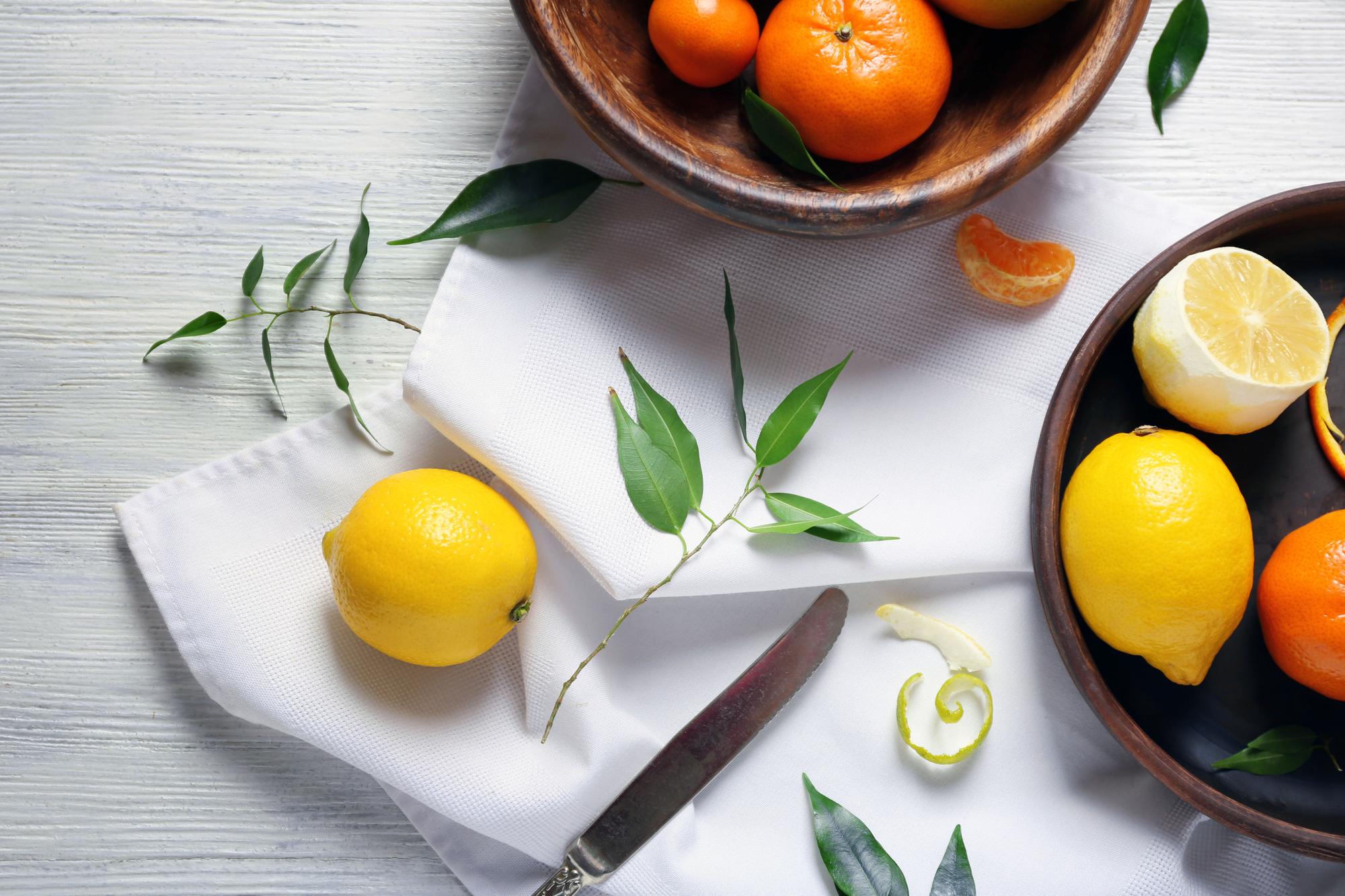 close-up of citrus segments and herbs