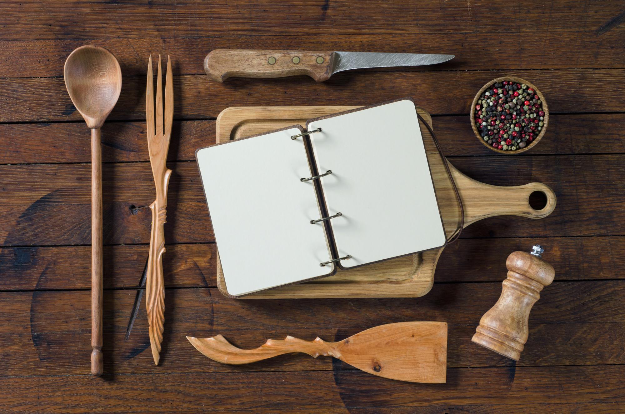 notebook with menu sketches and a pencil